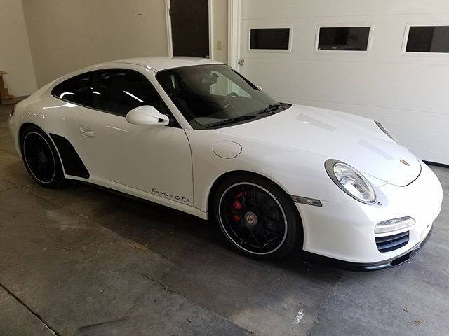 White Porsche 911 Carrera GTS after a ceramic coating install